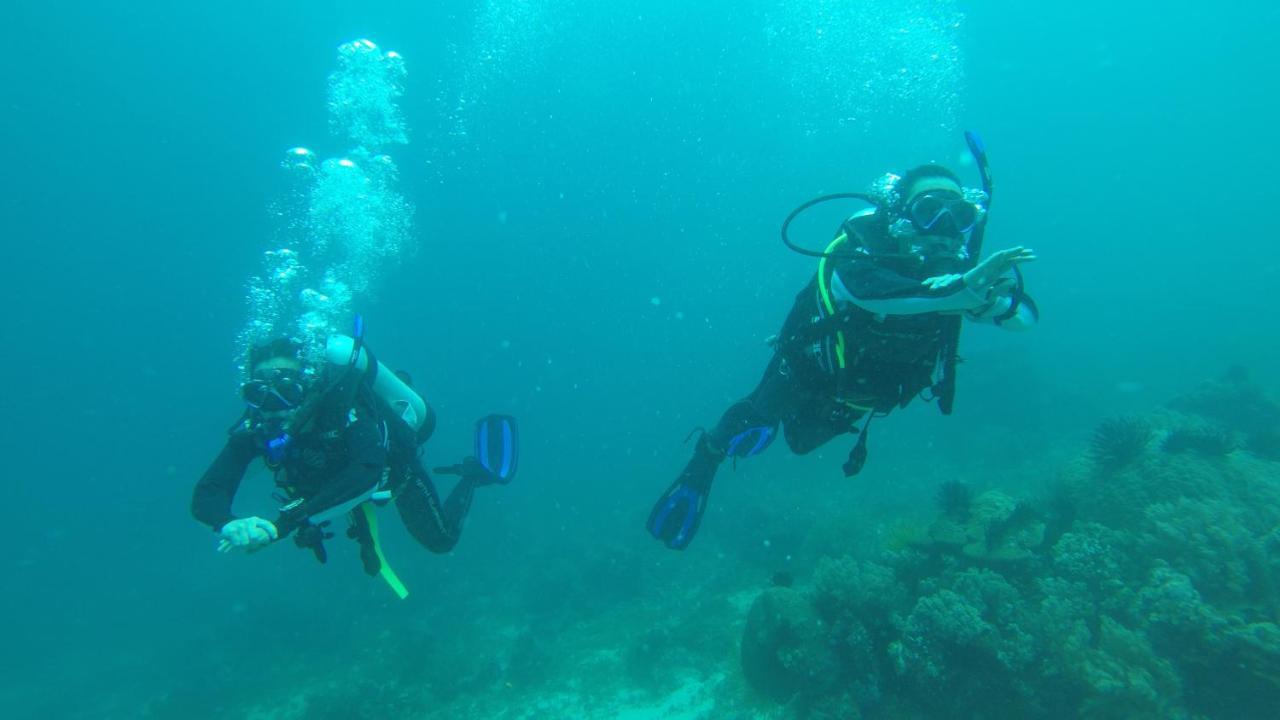 Southseas Beach Resort And Dive Center Сантандер Екстериор снимка