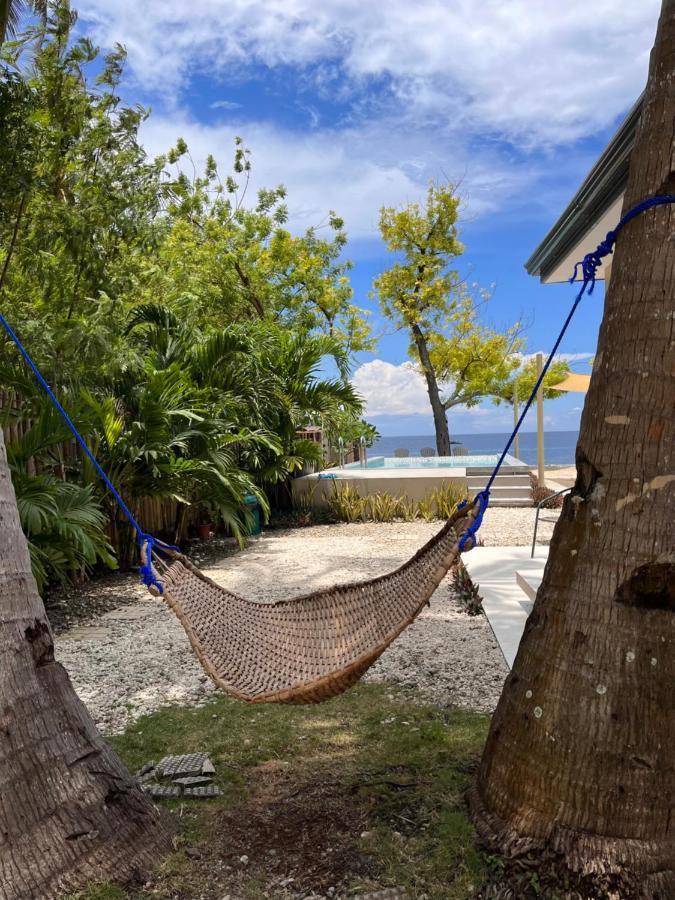 Southseas Beach Resort And Dive Center Сантандер Екстериор снимка
