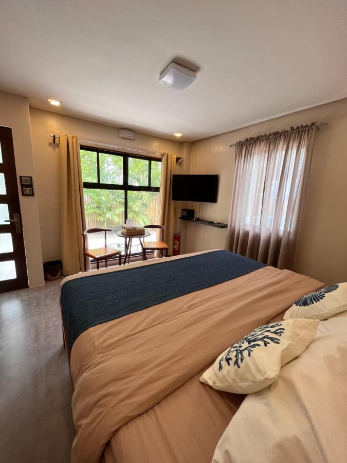 Southseas Beach Resort And Dive Center Сантандер Екстериор снимка
