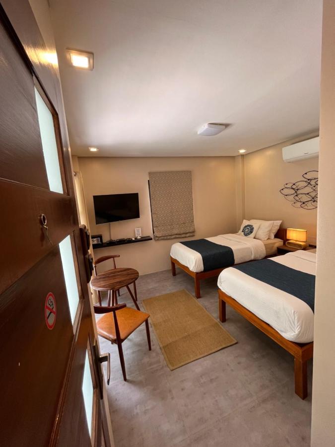 Southseas Beach Resort And Dive Center Сантандер Екстериор снимка
