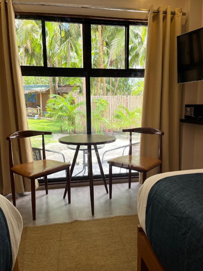 Southseas Beach Resort And Dive Center Сантандер Екстериор снимка