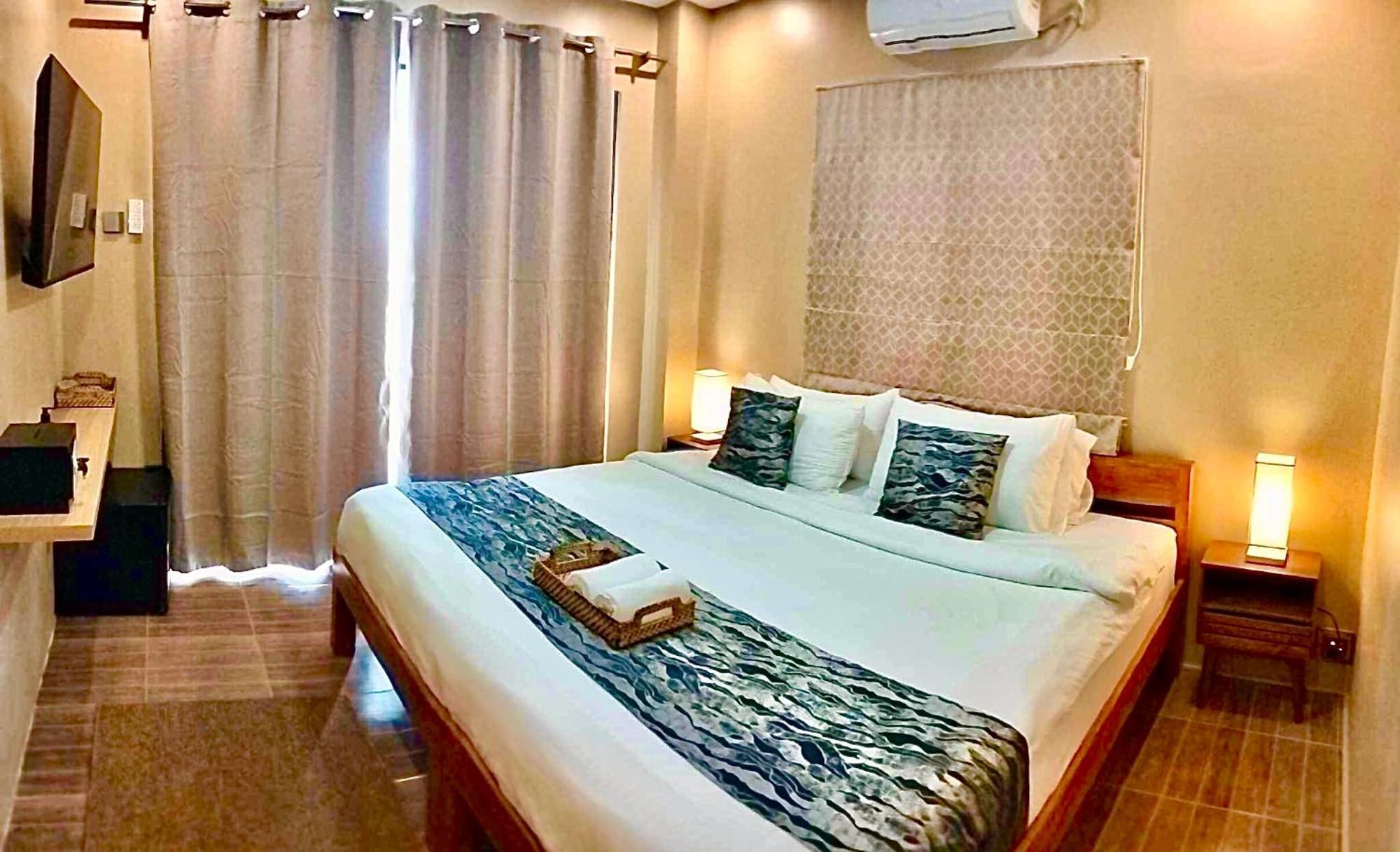 Southseas Beach Resort And Dive Center Сантандер Екстериор снимка