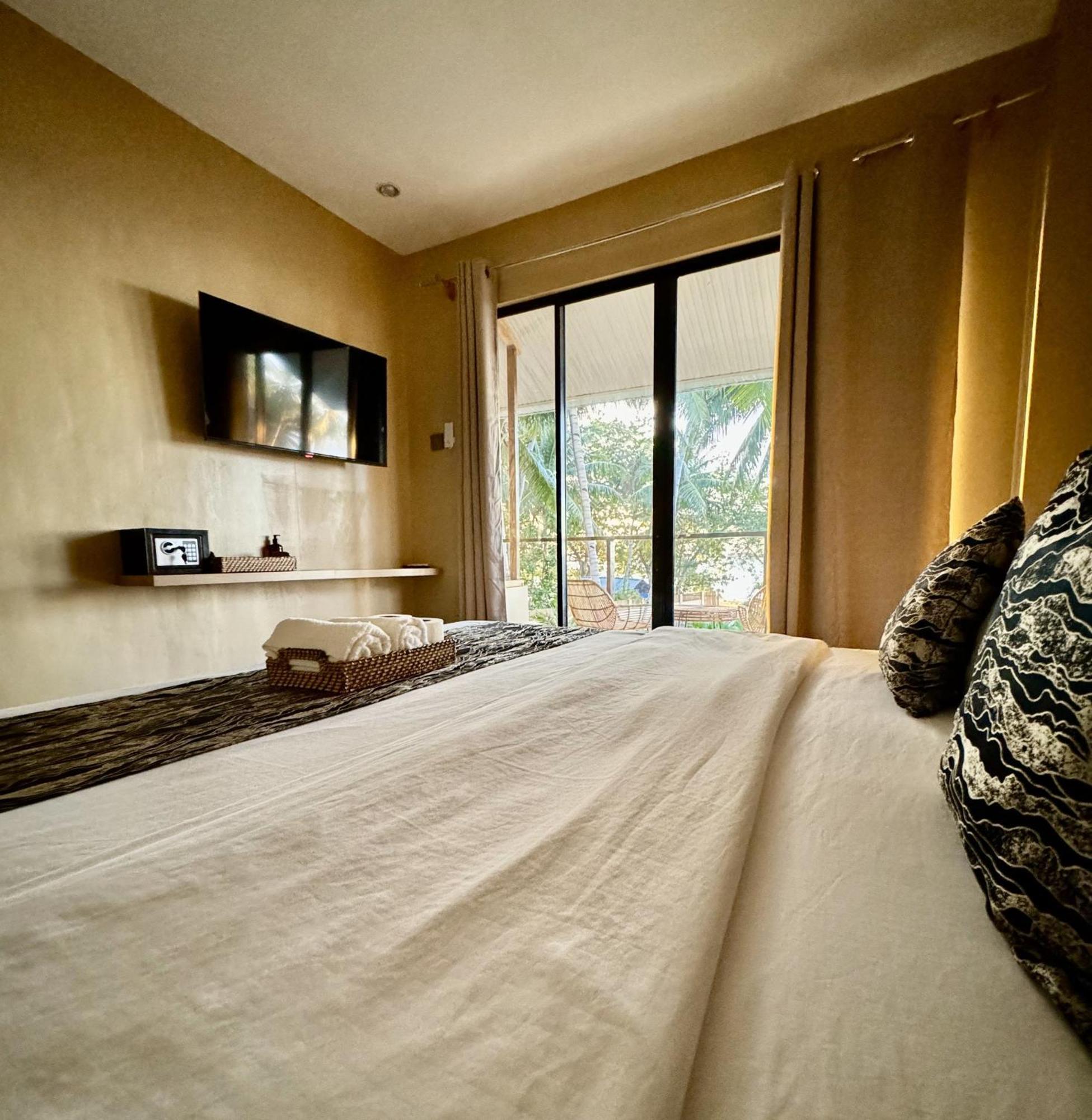 Southseas Beach Resort And Dive Center Сантандер Екстериор снимка