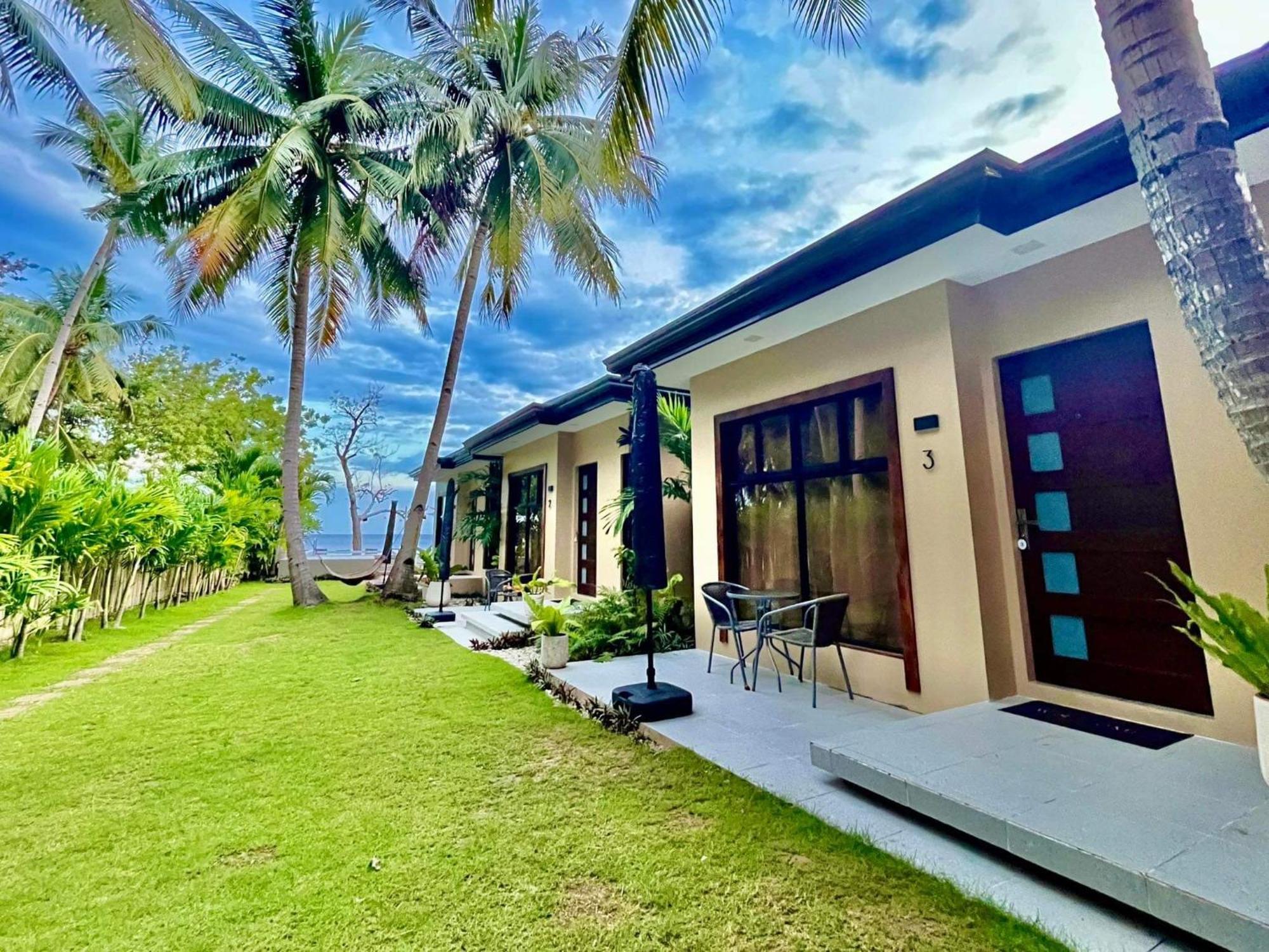Southseas Beach Resort And Dive Center Сантандер Екстериор снимка